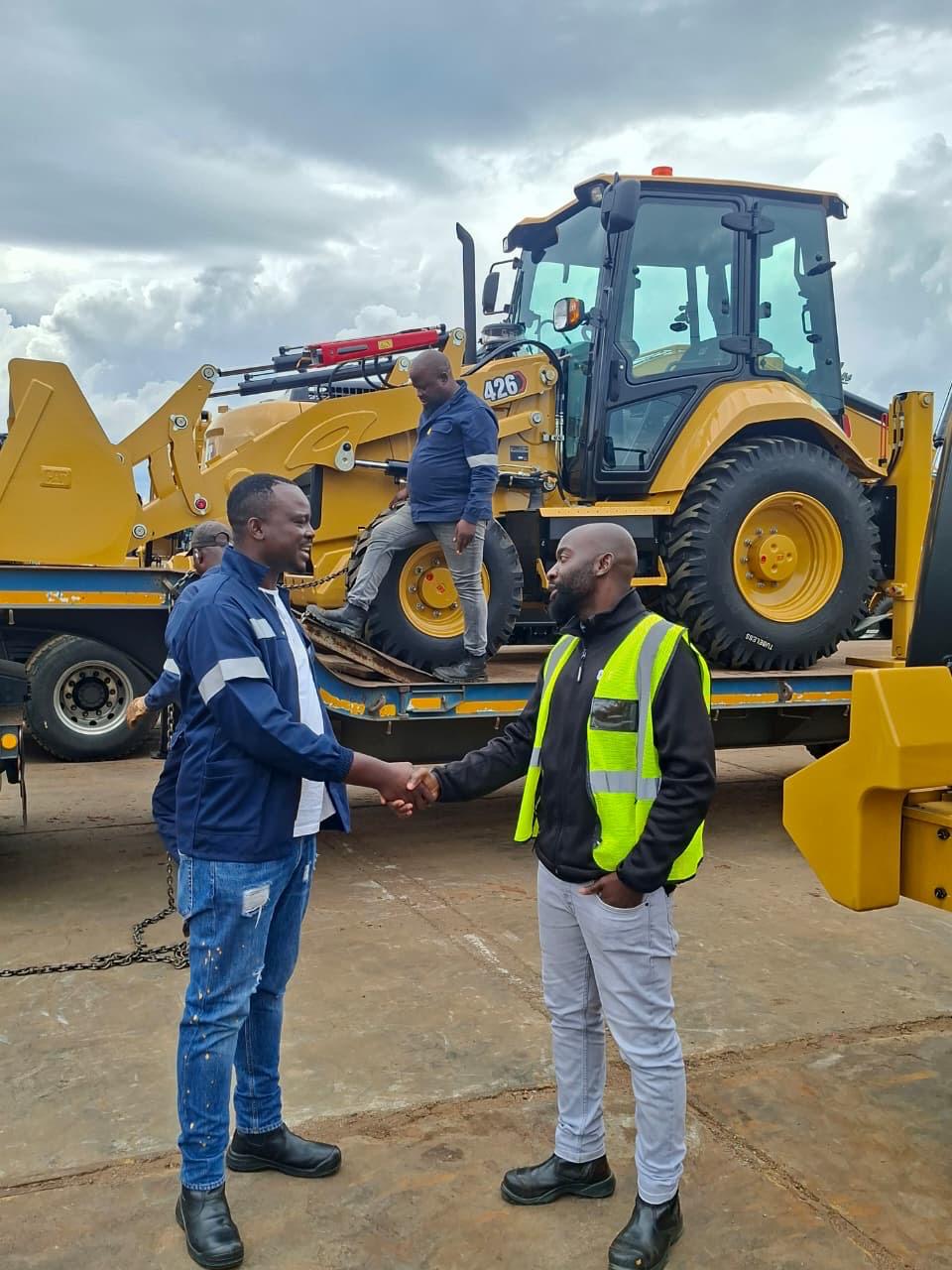 Willbarrow Trading team sealing an equipment handover in the field